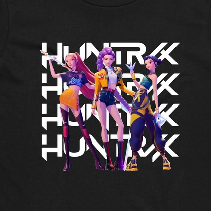 A close-up of a black t-shirt featuring a graphic print of three stylized female characters in colorful outfits, overlaid with the word 'HUNTER' repeated vertically in bold white letters.