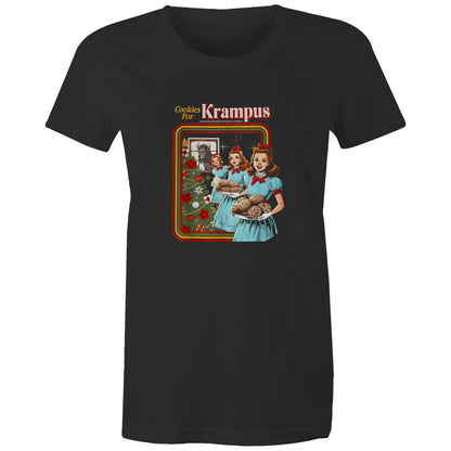 A graphic print on a dark charcoal t-shirt featuring a retro-style illustration of three women in light blue dresses carrying trays of cookies next to a decorated Christmas tree, with the text 'Cookies For Krampus' at the top.