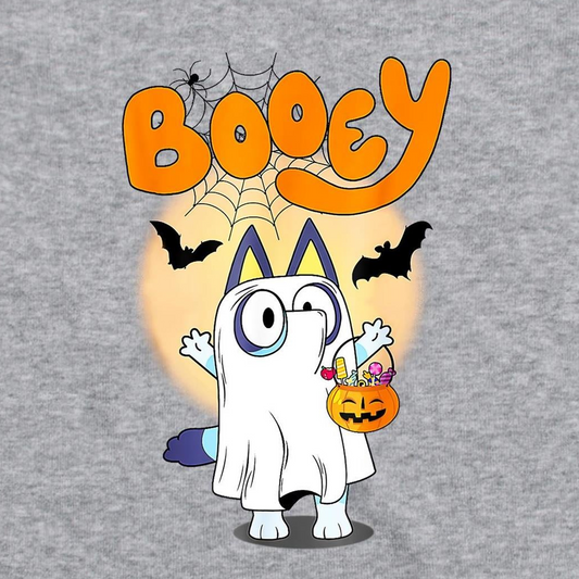 A white t-shirt featuring a colorful cartoon graphic of a ghost character dressed as Bluey, holding a jack-o'-lantern bucket of candy, with the word 'Booey' in orange above.