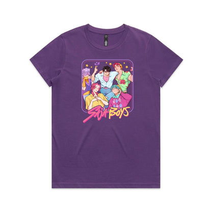 A close-up of a purple t-shirt featuring a colorful graphic print of five anime-style boys with the text 'Stunt Boys' written in a pink and yellow font below them.