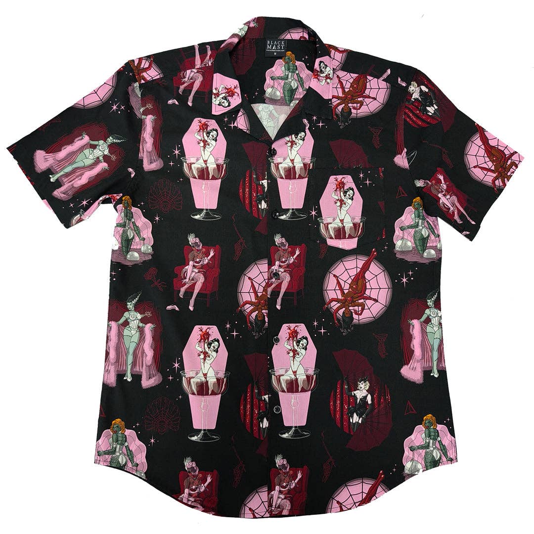A short-sleeve button-up shirt with a black background and a repeating gothic illustration pattern featuring pink coffins, red spiders, and vintage-style pin-up figures.