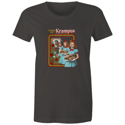 A graphic print on a dark charcoal t-shirt featuring a retro-style illustration of three women in light blue dresses carrying trays of cookies next to a decorated Christmas tree, with the text 'Cookies For Krampus' at the top.