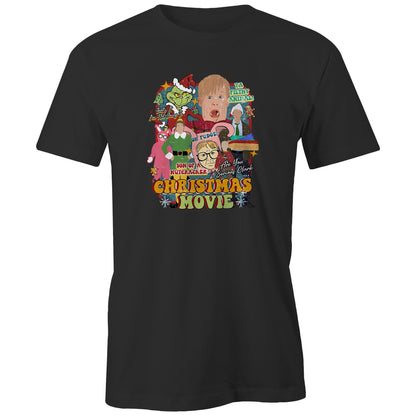 A close-up of a gray fabric garment featuring a large, colorful graphic print on the front. The print is a collage of characters and text from the movie 'Son of a Nutcracker: Are You Serious, Clerk?' including the Grinch in Santa hat, a blonde boy, a woman in a green dress, and bold text reading 'CHRISTMAS MOVIE'.