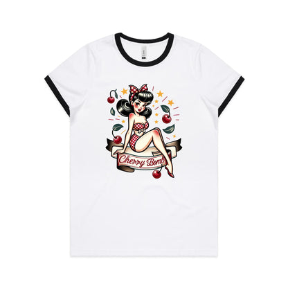 A white women's ringer tee with a Cherry Bomb pinup design featuring a character with stars and a red bow.