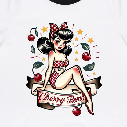 A white women's ringer tee with a Cherry Bomb pinup design featuring a character with stars and a red bow.