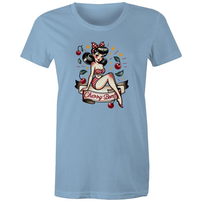 A black women's t-shirt with a printed graphic of a pinup style illustration featuring a character with a bow and stars, and the text 'Cherry Bomb'.
