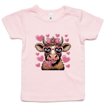 Infant pink t-shirt with a graphic of a cow with hearts and sunglasses.