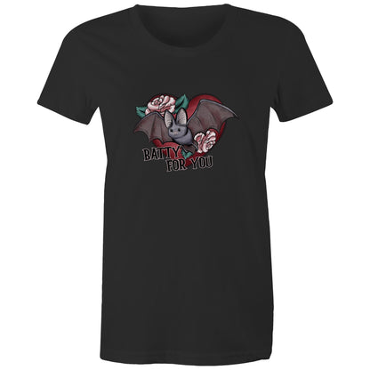 A pink women's t-shirt with a graphic print of a vampire bat and cherry blossoms, and the text 'BATTY FOR YOU'.