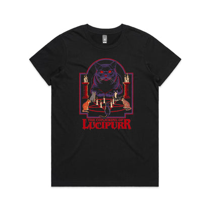 A black graphic print featuring a large purple cat with glowing red eyes sitting above a pentagram and candles, with smaller cats around it and the text 'THE CONJURING OF LUCIPURR' in red at the bottom.