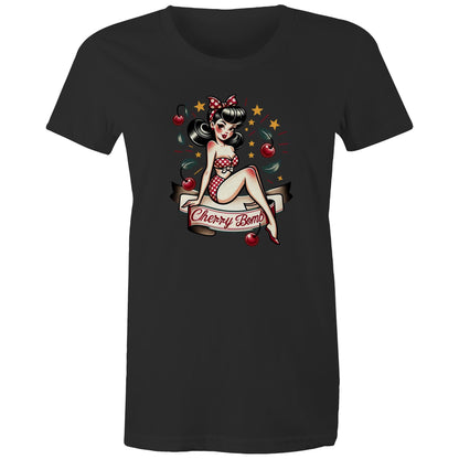 A black women's t-shirt with a printed graphic of a pinup style illustration featuring a character with a bow and stars, and the text 'Cherry Bomb'.