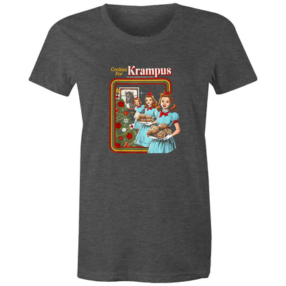 A graphic print on a dark charcoal t-shirt featuring a retro-style illustration of three women in light blue dresses carrying trays of cookies next to a decorated Christmas tree, with the text 'Cookies For Krampus' at the top.