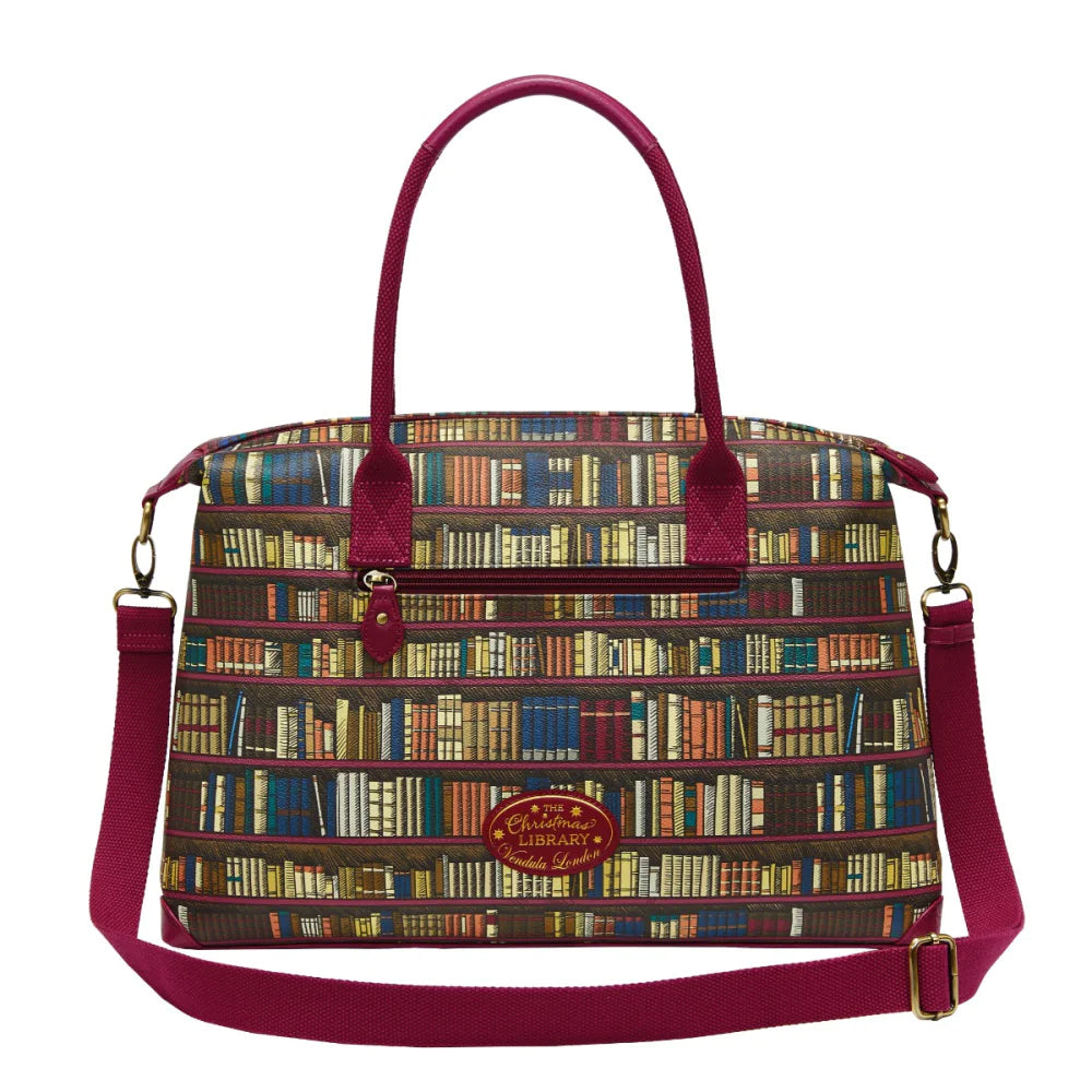 Handbag with bookshelf pattern and red straps on a white background