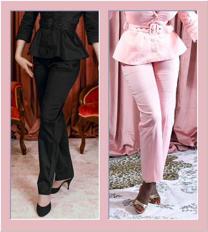 A side-by-side comparison of two women's pantsuits: on the left, a black peplum top and matching trousers with black heels; on the right, a light pink peplum top and matching trousers with metallic heels. Both are shown from the waist down in an indoor setting with draped curtains.