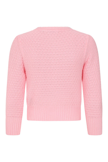 Pink sweater on a white background